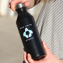 Load image into Gallery viewer, Person holding black stainless steel water bottle